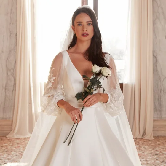 abito da sposa con maniche